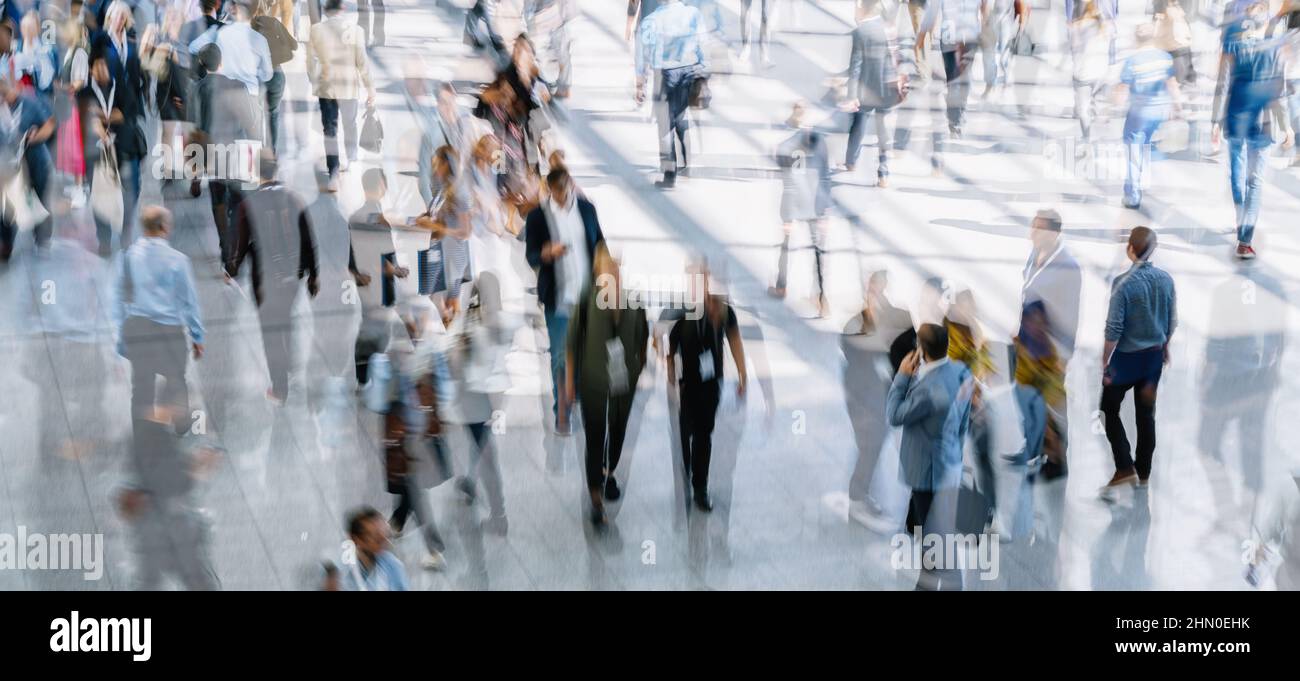 Crowd of anonymous people walking on busy city street Stock Photo - Alamy