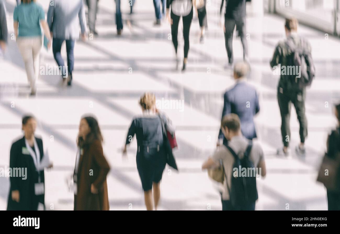 Crowd of anonymous people walking on busy city street Stock Photo - Alamy