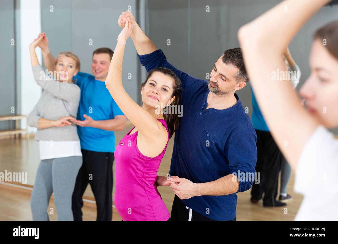 Young couple practicing active dance in pair Stock Photo