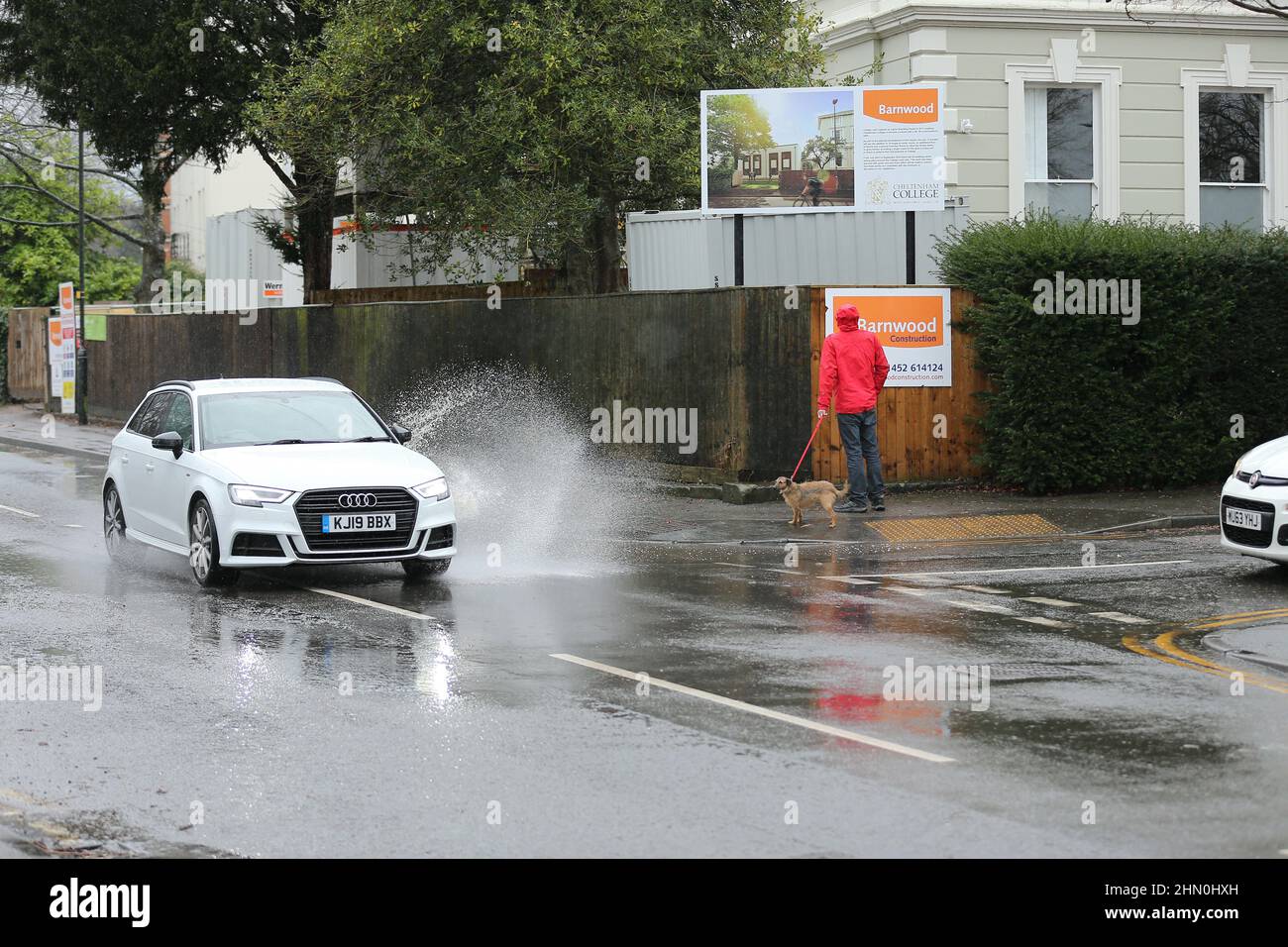 Cheltenham, UK, 13th February, 2022. UK Weather.Heavy rain creating big puddles on the roads for drivers.Credit: Gary Learmonth / Alamy Live News Stock Photo