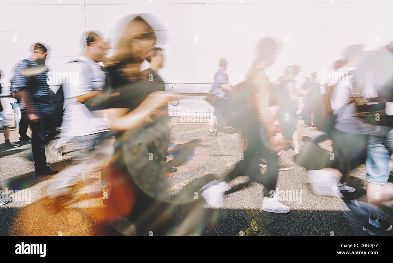 Anonymous crowd of people walking on a busy City street Stock Photo - Alamy