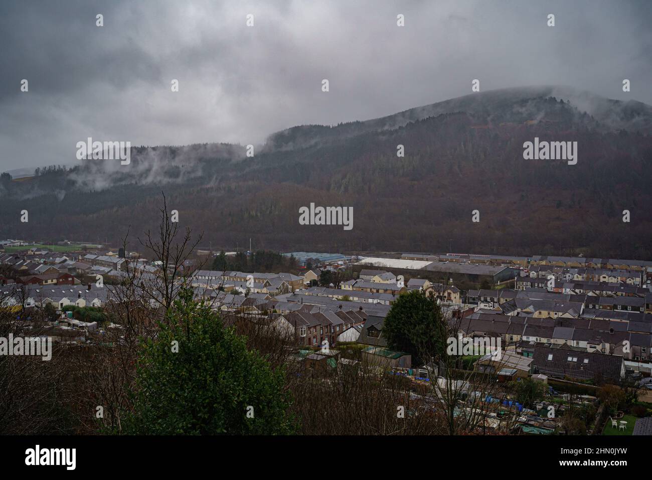 Clouds and rain cover the hills beyond the Welsh village of Treherbert ...