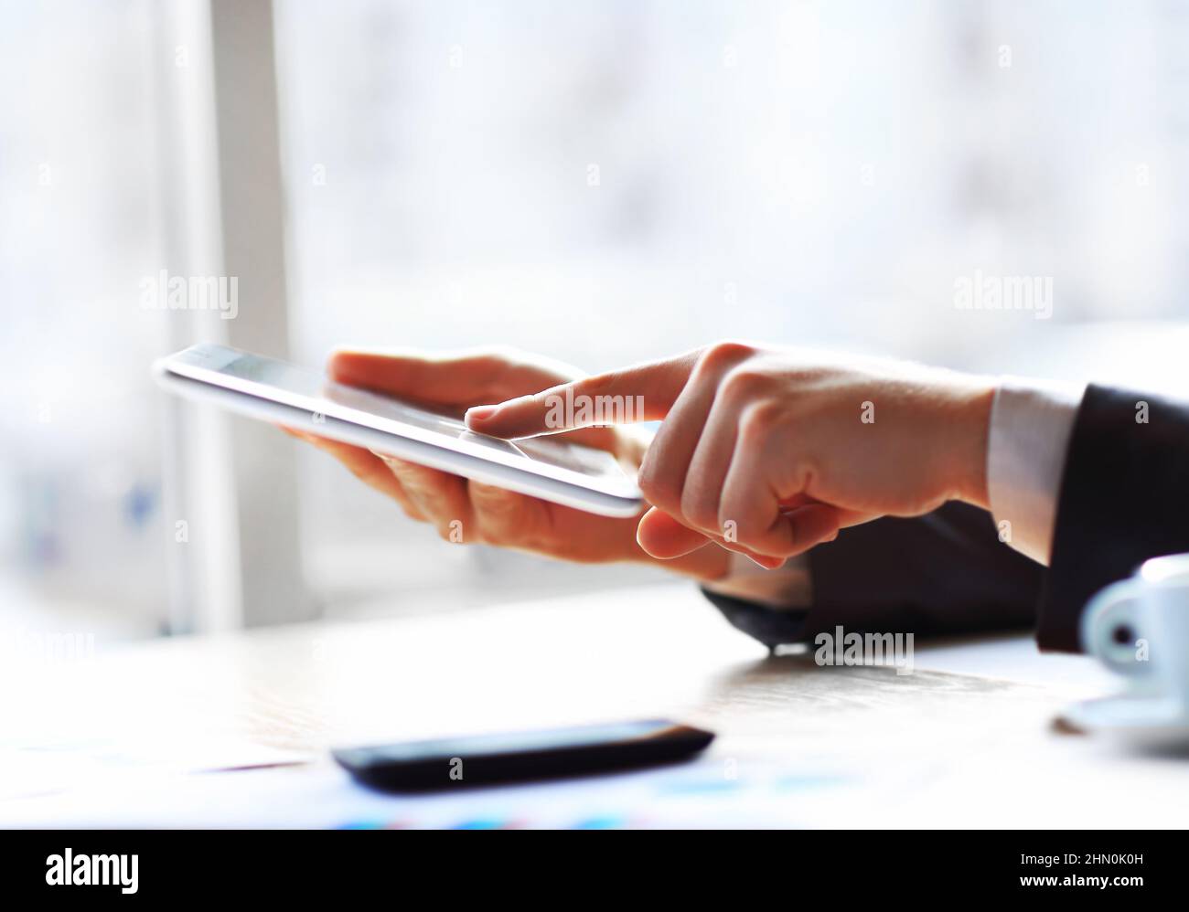 Hand touching on modern digital tablet pc at the workplace Stock Photo ...