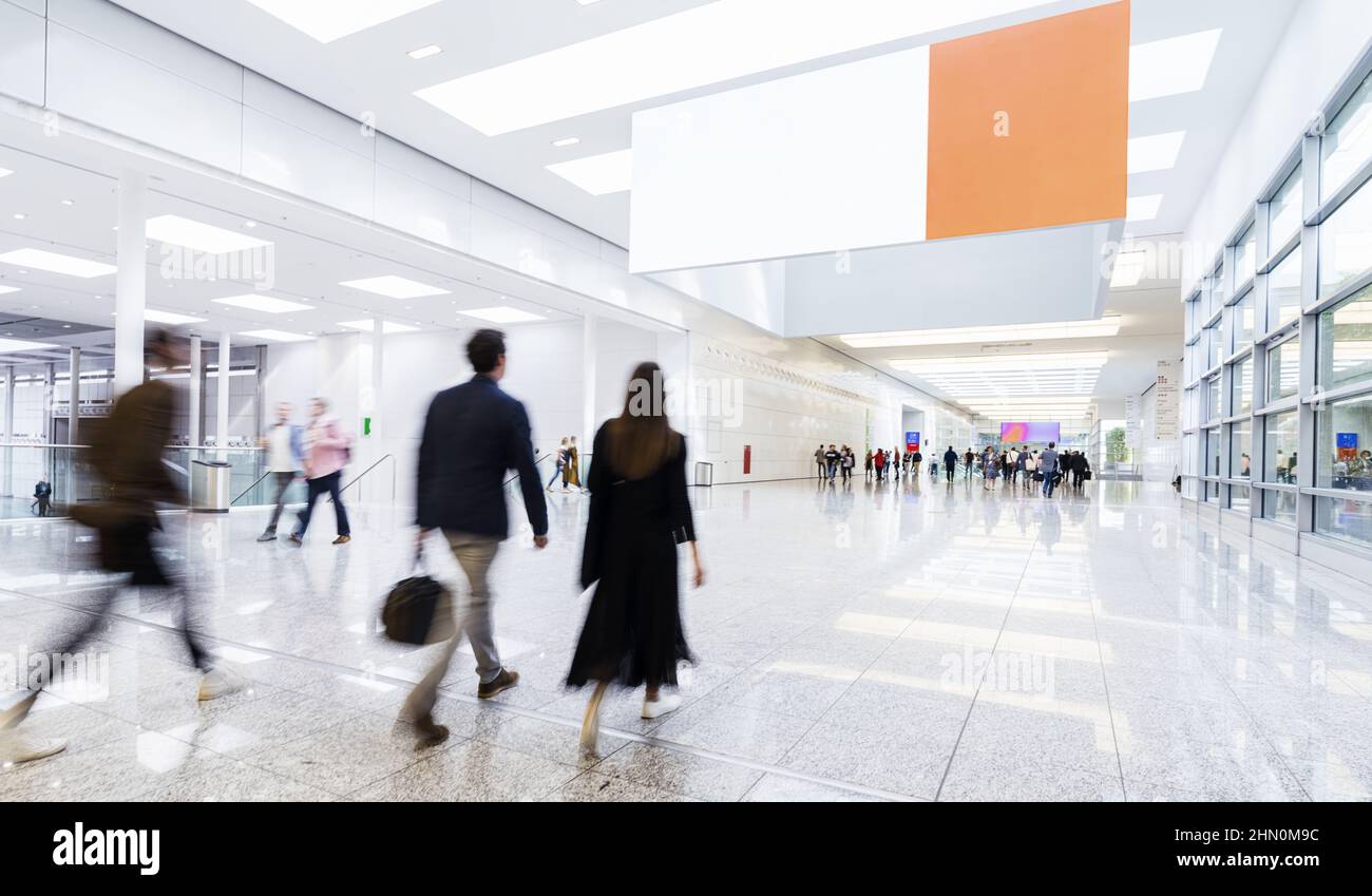 Visitors walk through expo hi-res stock photography and images - Alamy