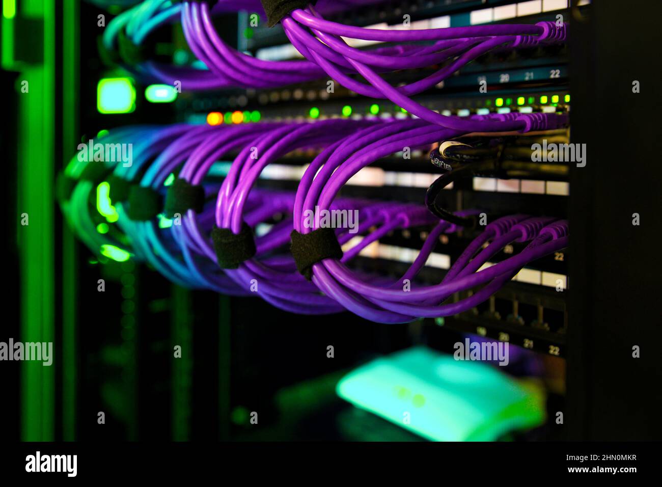 Data Cabinet Cables RJ45 Patch Cables and lights Stock Photo