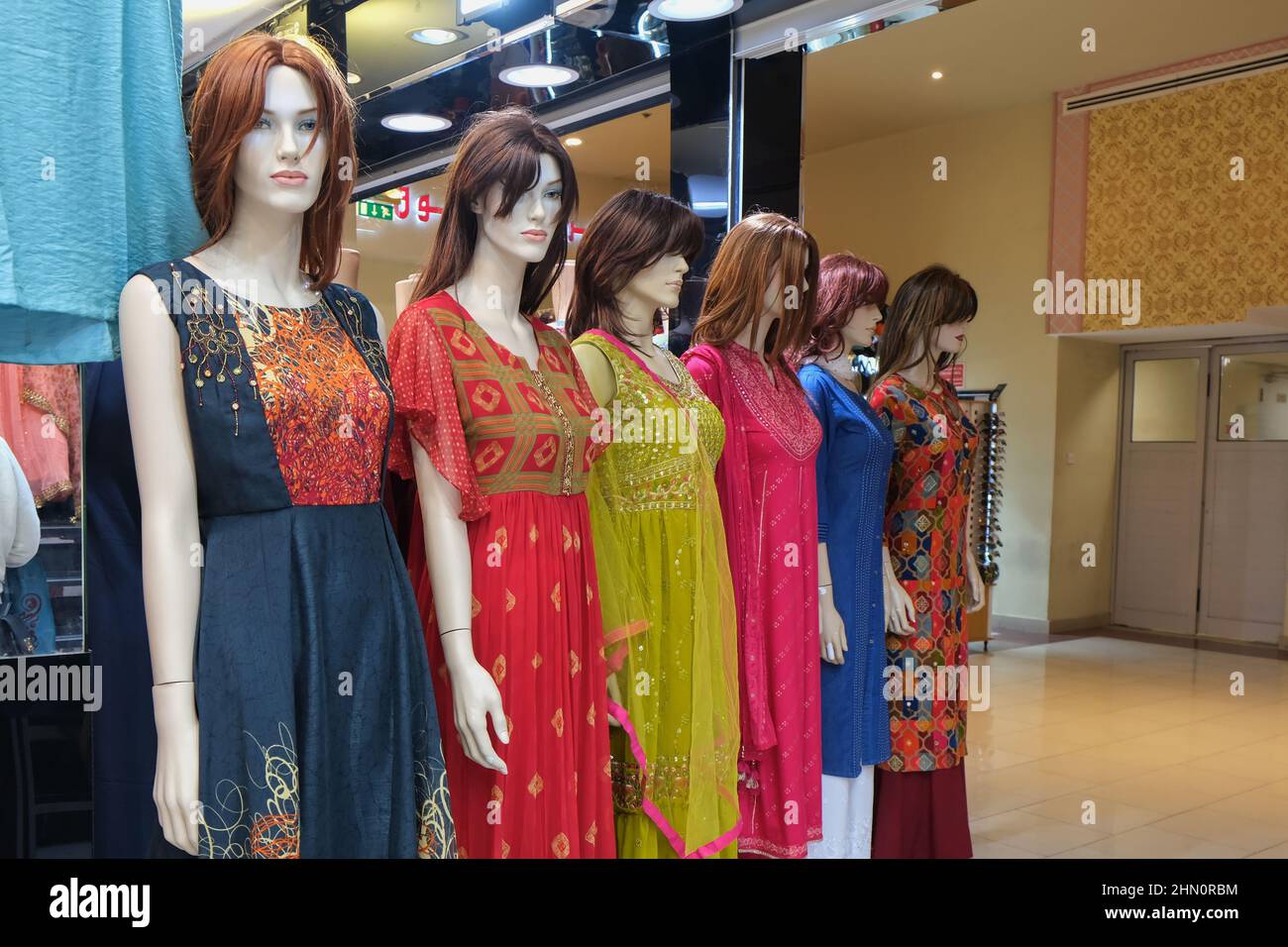 Mannequins dressed in trendy authentic national Central and South Asia fashion casual clothes  Stock Photo