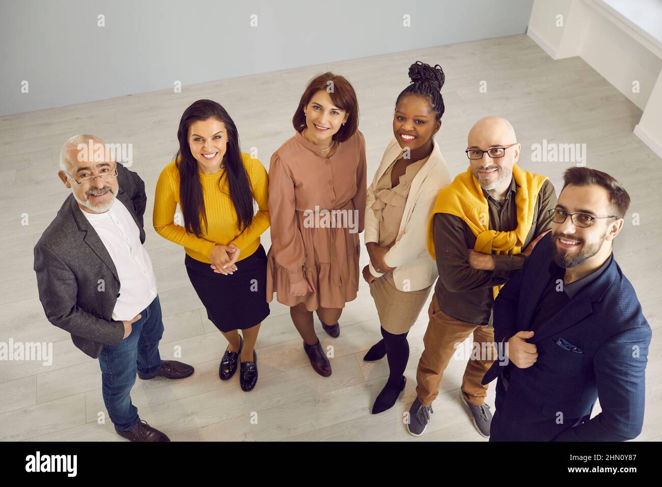 Portrait of diverse multiethnic businesspeople pose in office Stock Photo