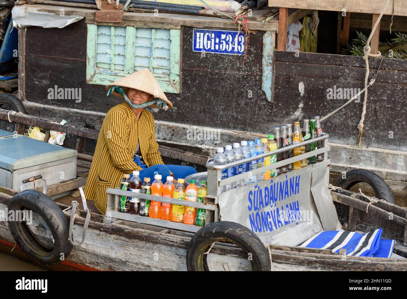 Food traders at the busy Cai Rang floating market, near Can Tho, Mekong Delta, Southern Vietnam, Southeast Asia Stock Photo
