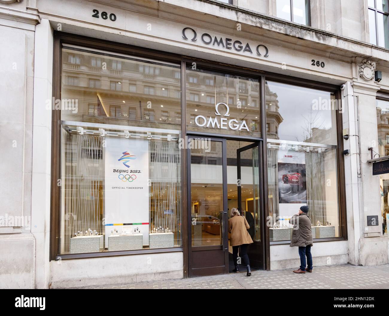 Omega Store London UK; a woman entering the Omega shop, Regent Street ...