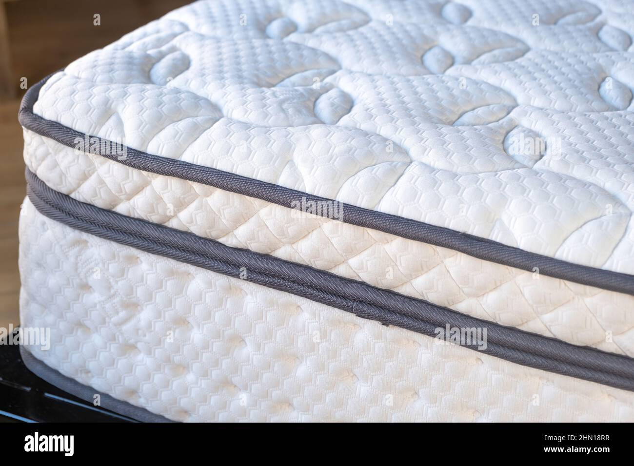 Mattress orthopedic, new and clean on a bed close up view. Home bedroom, hotel room interior detail. Comfort and healthy sleep Stock Photo