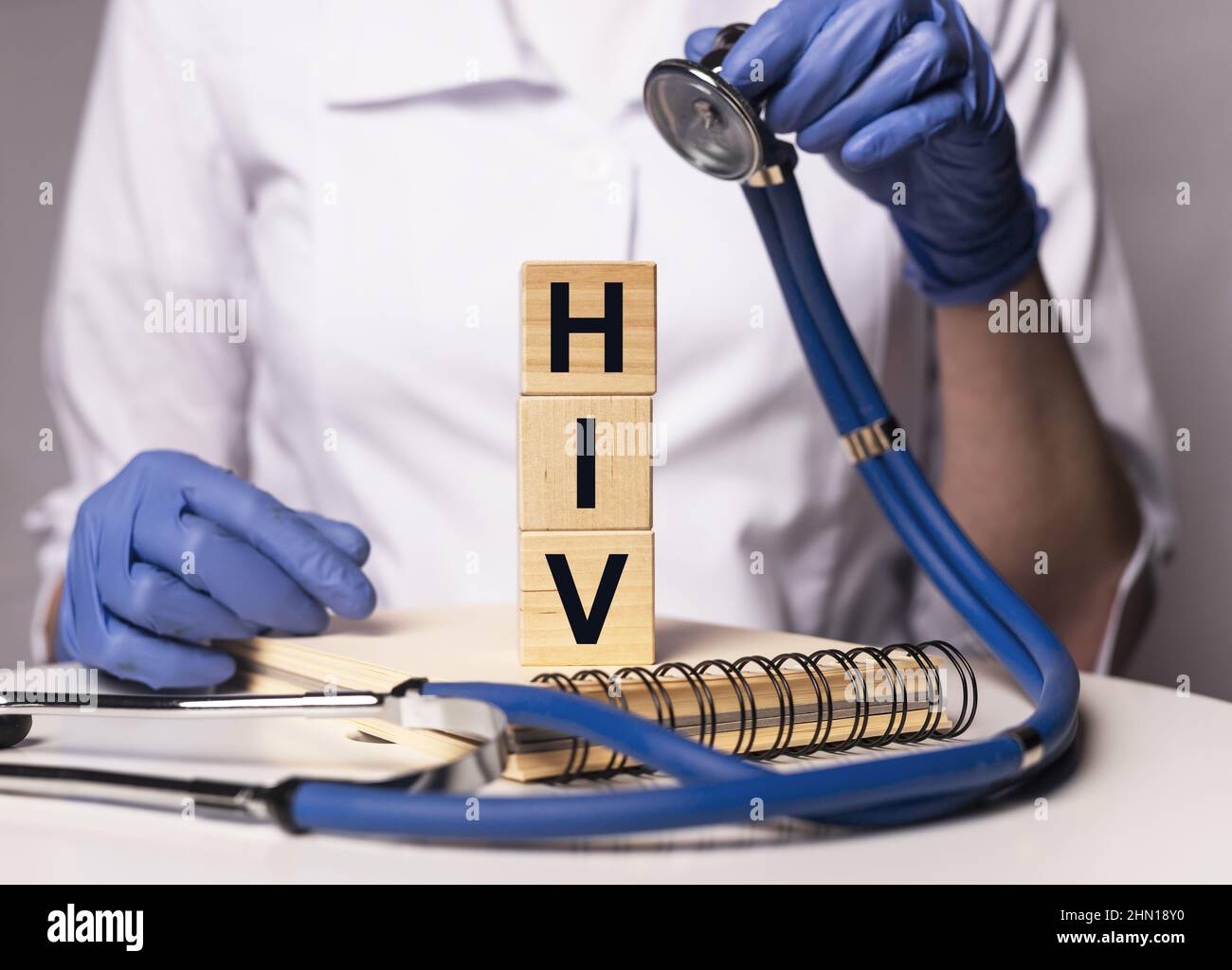 HIV acronym, word in doctor hands. photo Stock Photo