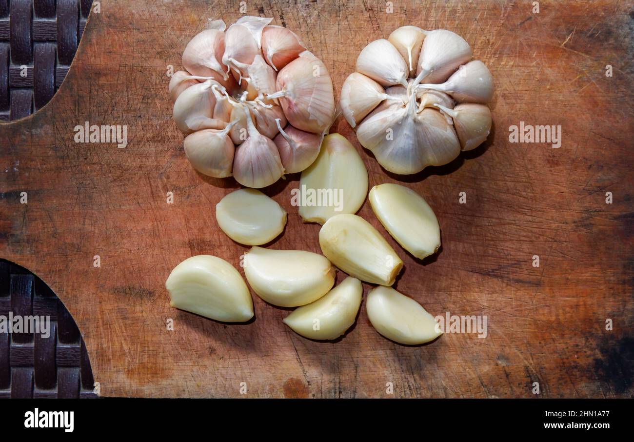 garlic. garlic cloves. peel the garlic clove. Garlic is one of the main