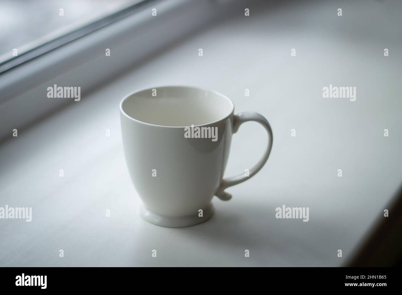 On windowsill cup tea hi-res stock photography and images - Alamy
