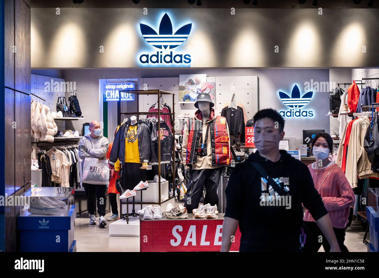 Hong Kong, China. 12th Feb, 2022. Shoppers are seen at the German  multinational sportswear brand Adidas