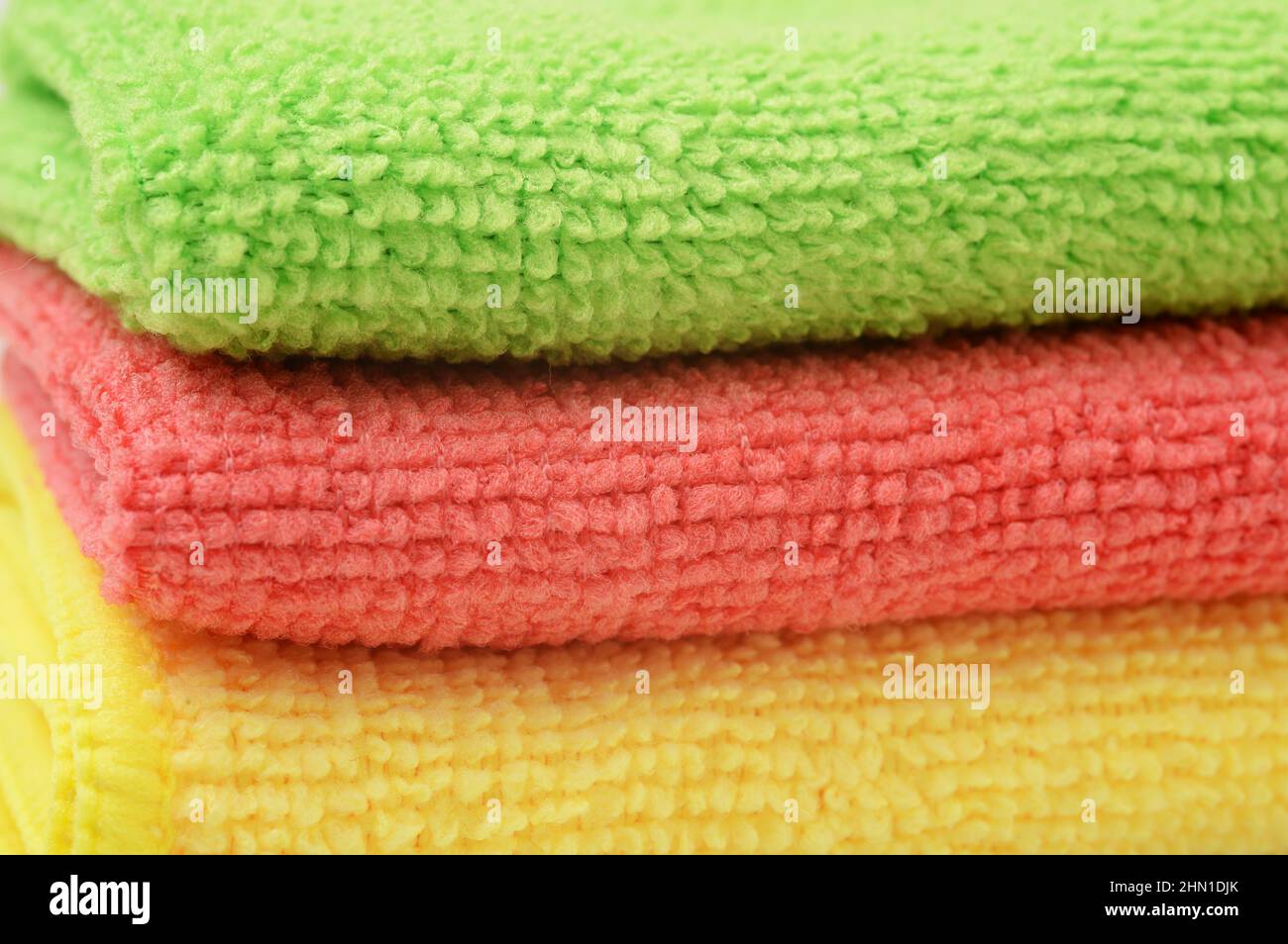 Multi-colored soft terry towels as a background. Stock Photo