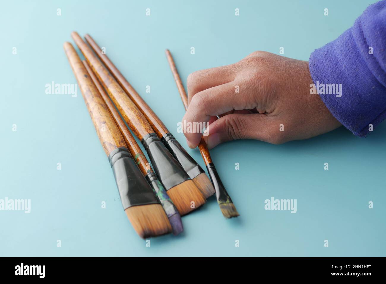 Close up hand pick paper hi-res stock photography and images - Alamy