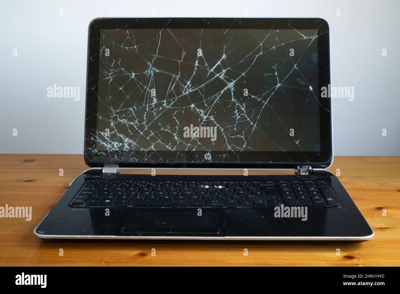 A laptop computer with broken screen. Stock Photo