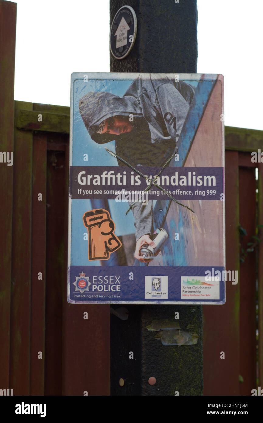 Graffiti is vandalism sign warning that it is an offence Stock Photo