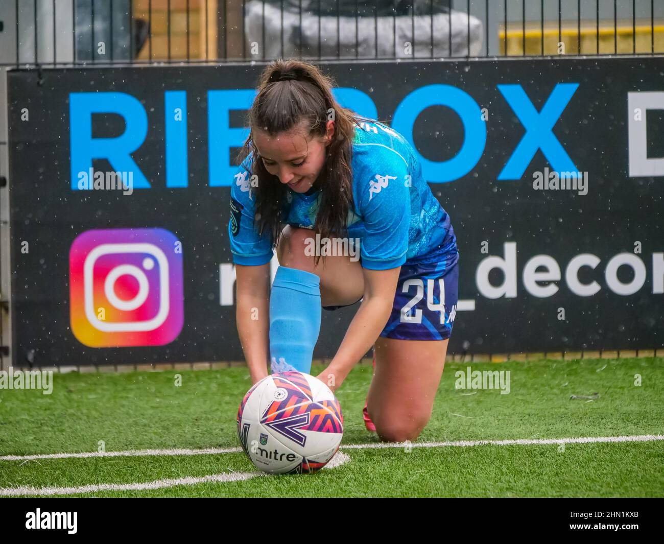 Bromley, Kent, UK. 13th Feb, 2022. Bromley FC Stadium, Hayes Lane, Bromley, Kent 13th February 2022 Shanade Hopcroft (24 London City Lionesses) ties her laces before taking a corner in the match between Crystal Palace Women vs London City Lionesses in the Women's FA Championship at Bromley FC Stadium, Hayes Lane, Bromley on 13th February 2022 Claire Jeffrey/SPP Credit: SPP Sport Press Photo. /Alamy Live News Stock Photo