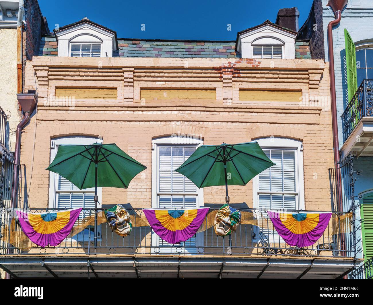 New Orleans French Quarter balcony during Mardi Gras, New Orleans, Louisiana, USA. Stock Photo