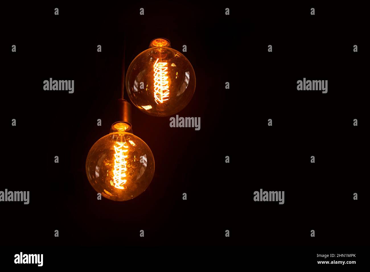 Edison light bulb, filament filament in vintage lamps Stock Photo - Alamy