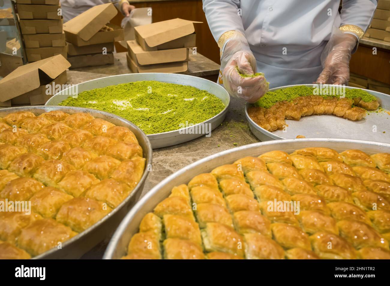 Delicious Turkish baklava covered with ground pistachios, Turkey Stock Photo