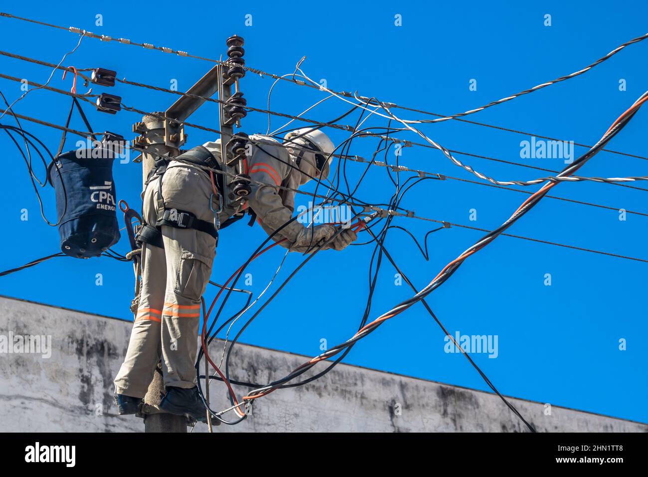 Power transmission line power pole safety net hi-res stock photography