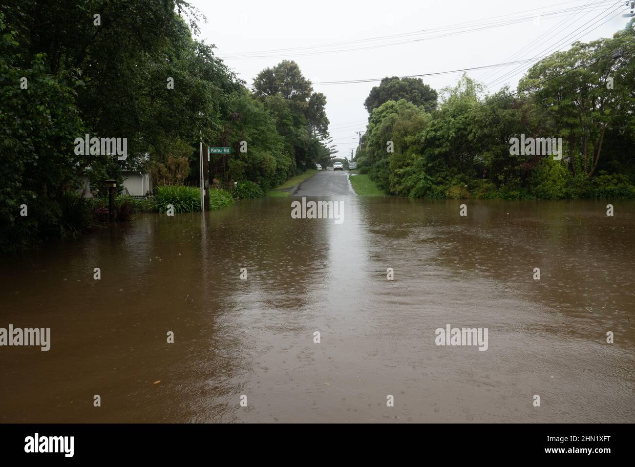 Flooded road blocks road after torrential rain in Kapiti, New Zealand Stock Photo