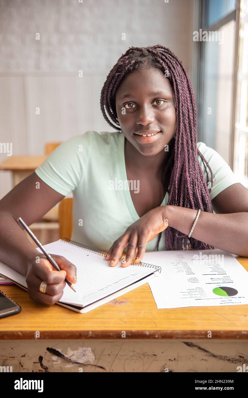 African high school girl having test at classroom Stock Photo