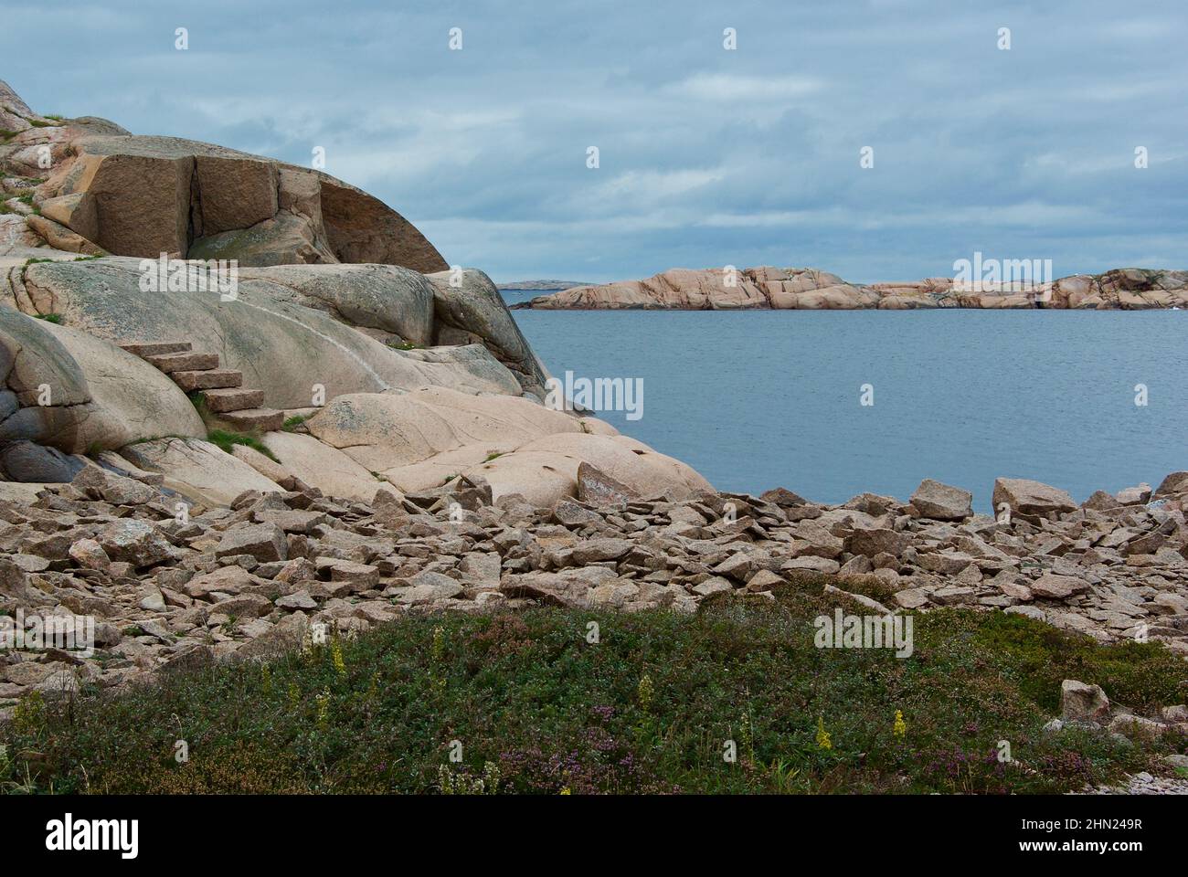 Landscape with ocean and red granite boulders at Stångehuvud nature ...