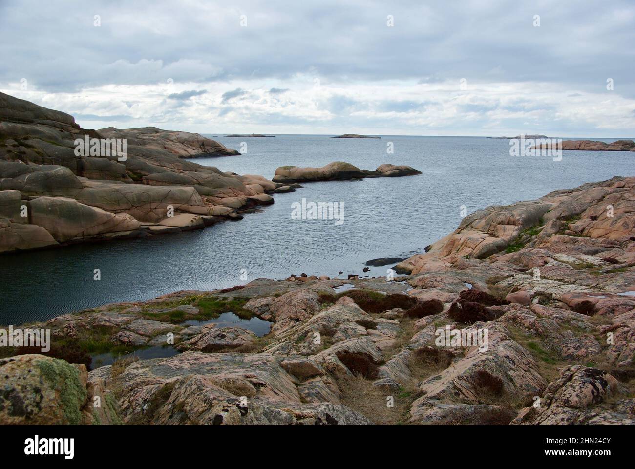 Landscape with ocean and red granite boulders at Stångehuvud nature ...