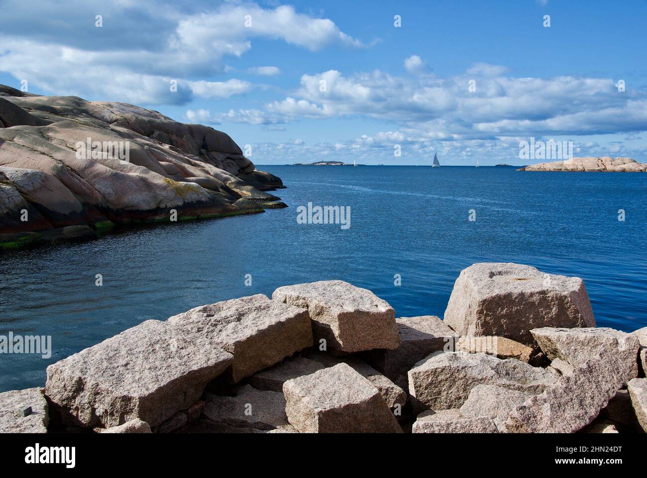 Landscape with ocean and red granite boulders at Stångehuvud nature ...