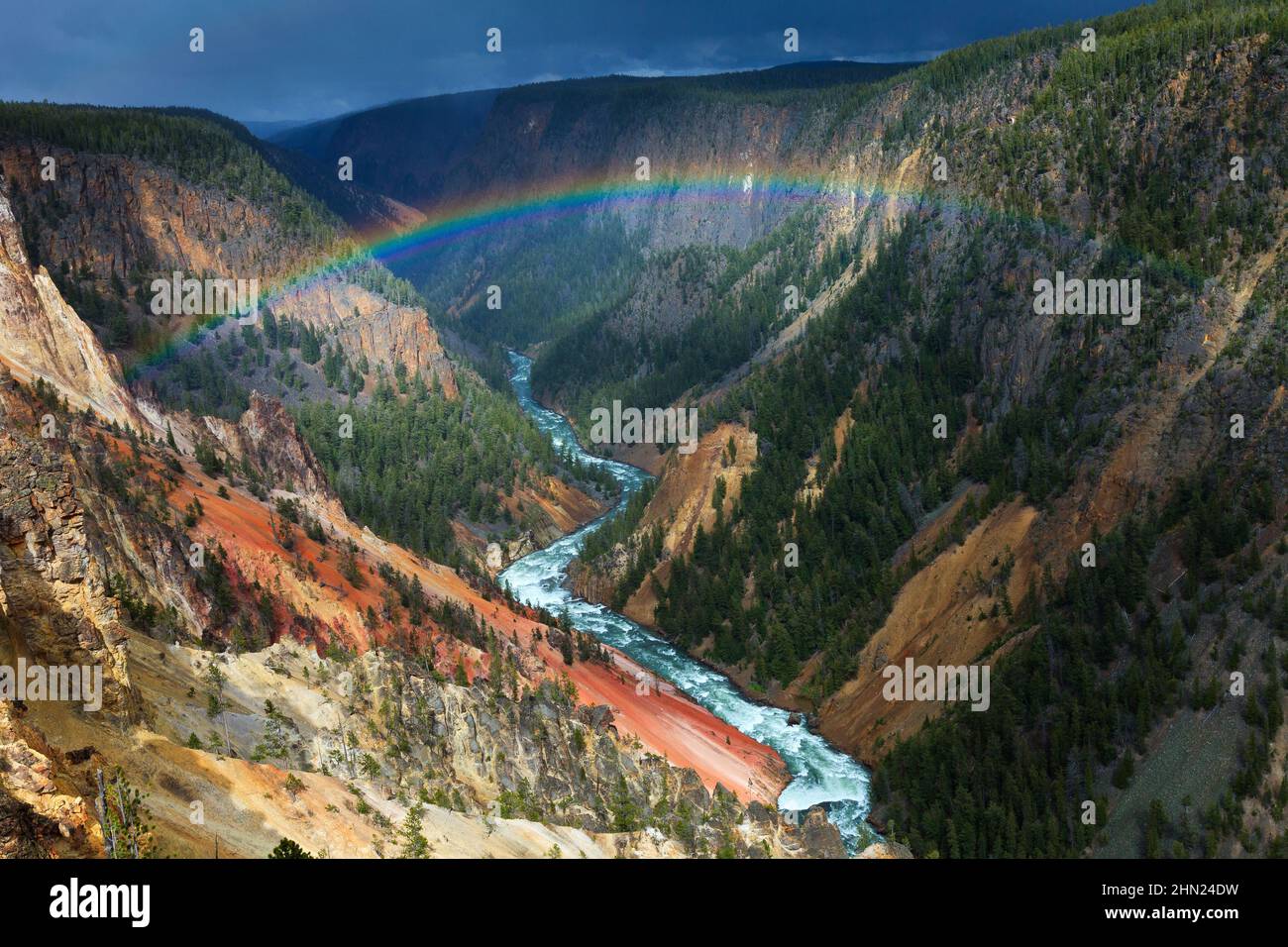 Rainbow and summer thunderstorm, over Yellowstone Grand Canyon and river, Yellowstone NP, Wyoming, USA Stock Photo
