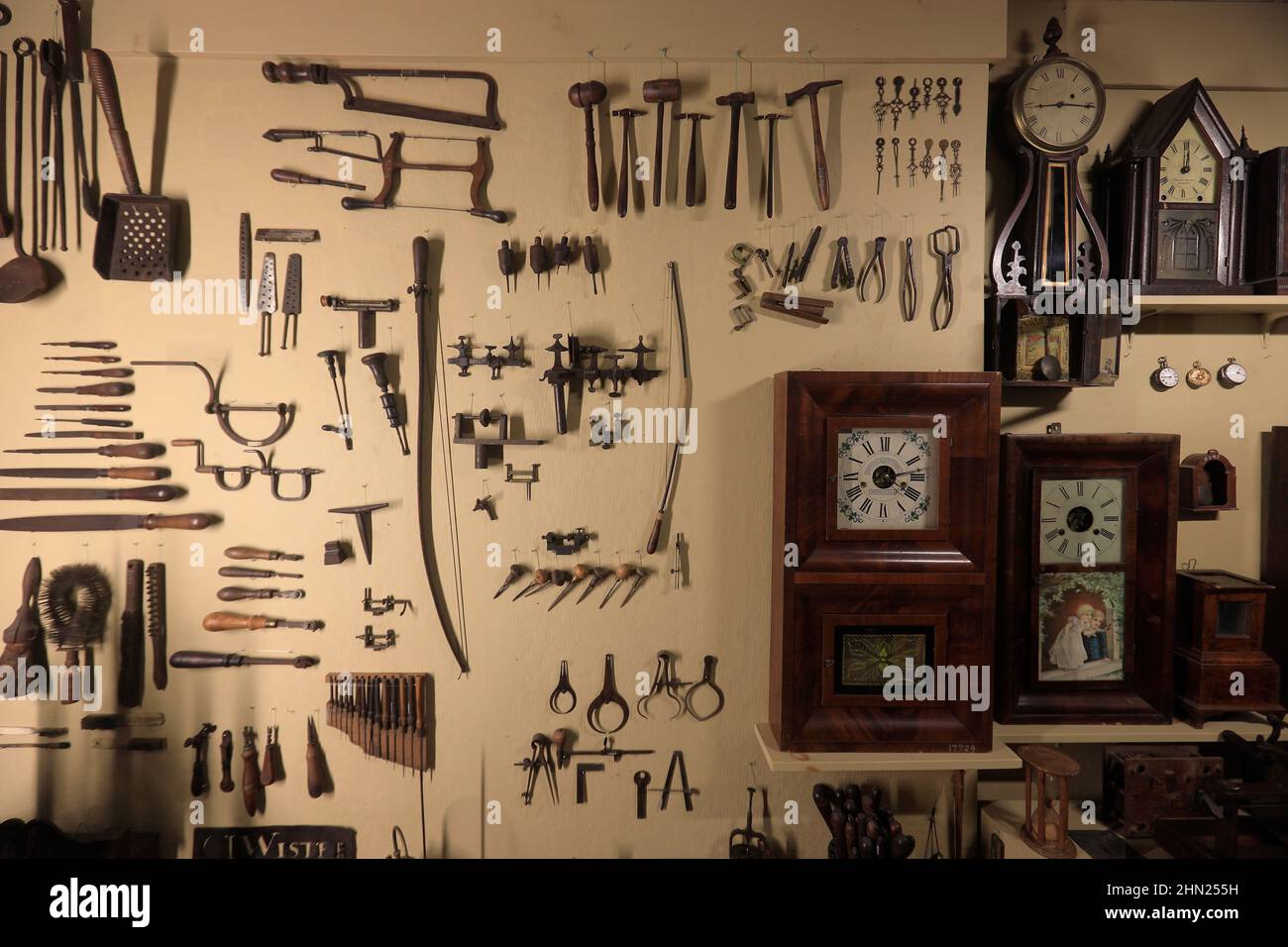 Clocks and clock making tools display in Mercer Museum & Library