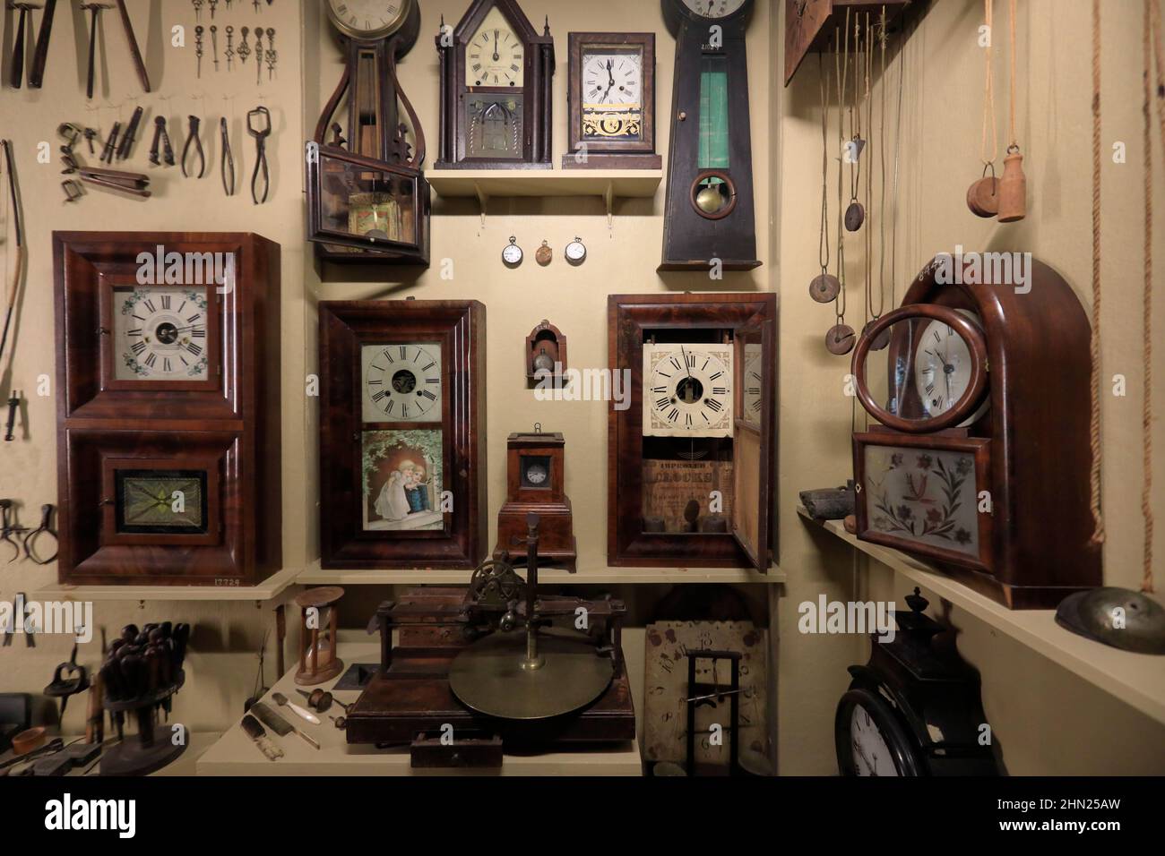 Antique clocks and clock making tools display in Mercer Museum