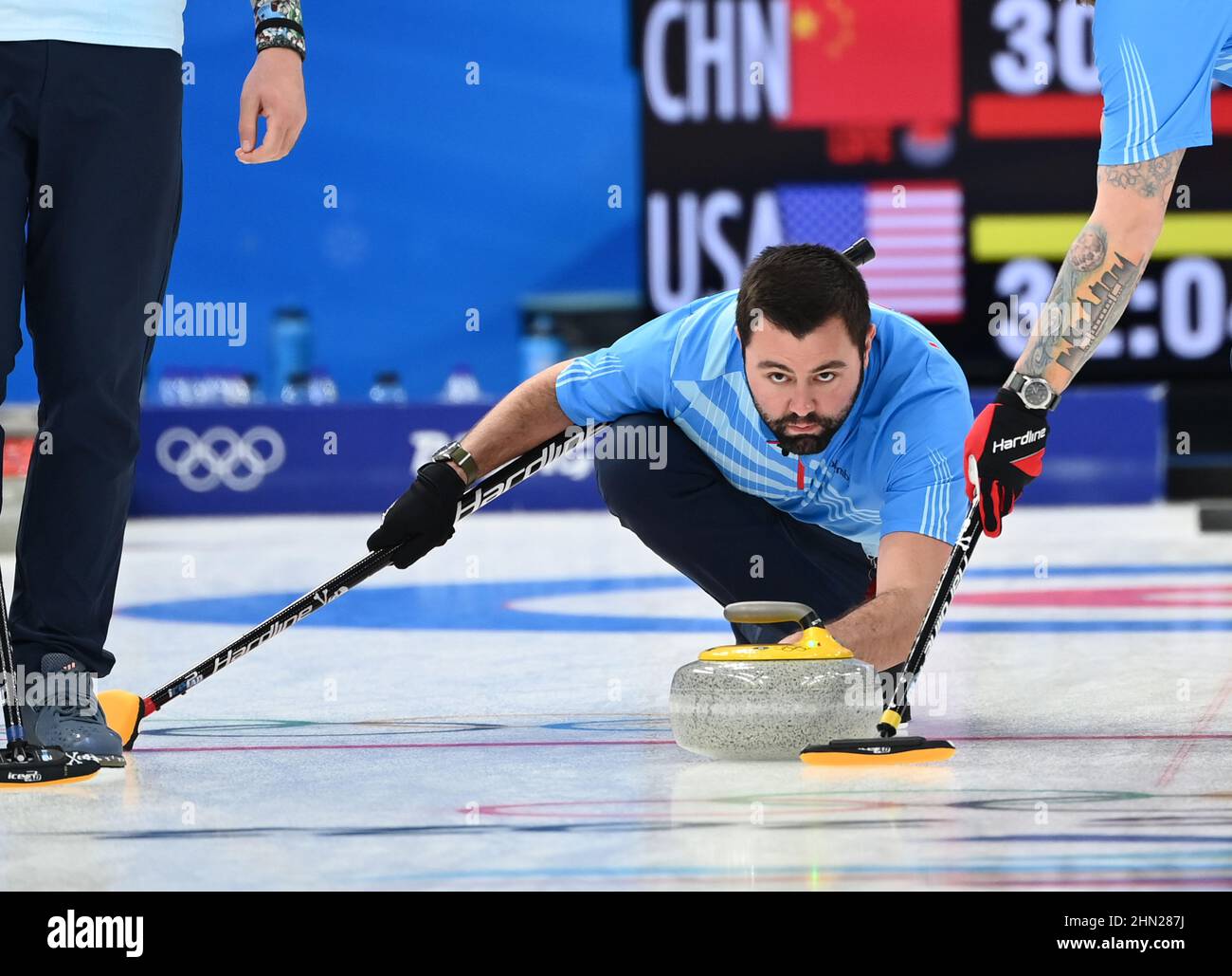 Beijing, China. 13th Feb, 2022. John Landsteiner of the United States competes during the curling men's round robin session 7 of the Beijing 2022 Winter Olympics between China and the United States at National Aquatics Centre in Beijing, capital of China, Feb. 13, 2022. Credit: Li He/Xinhua/Alamy Live News Stock Photo