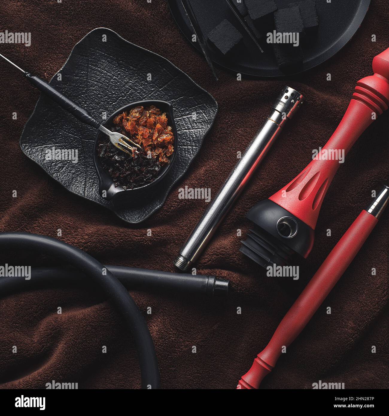 Parts of the hookah on blue wooden background. Hookah accessorie, Copy