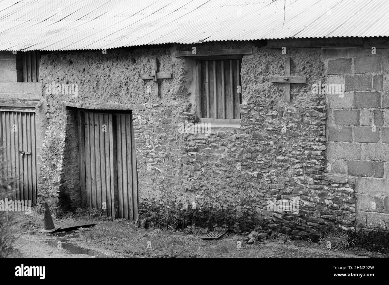 Old farm building made of stone and cob strengthened with block work - near Winkleigh, Devon, UK Stock Photo