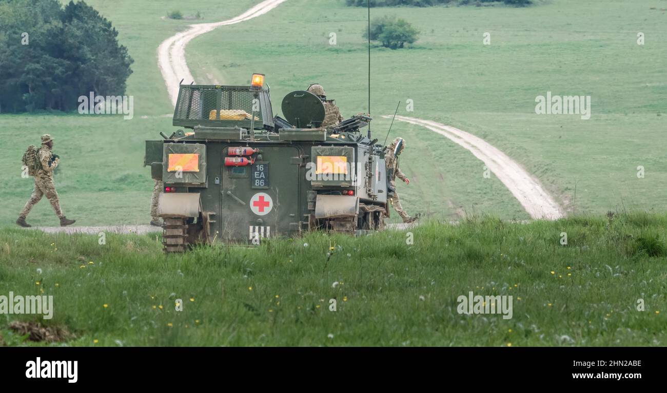 British army FV432 Bulldog armoured personnel carrier ambulance on a military exercise Wilts UK Stock Photo
