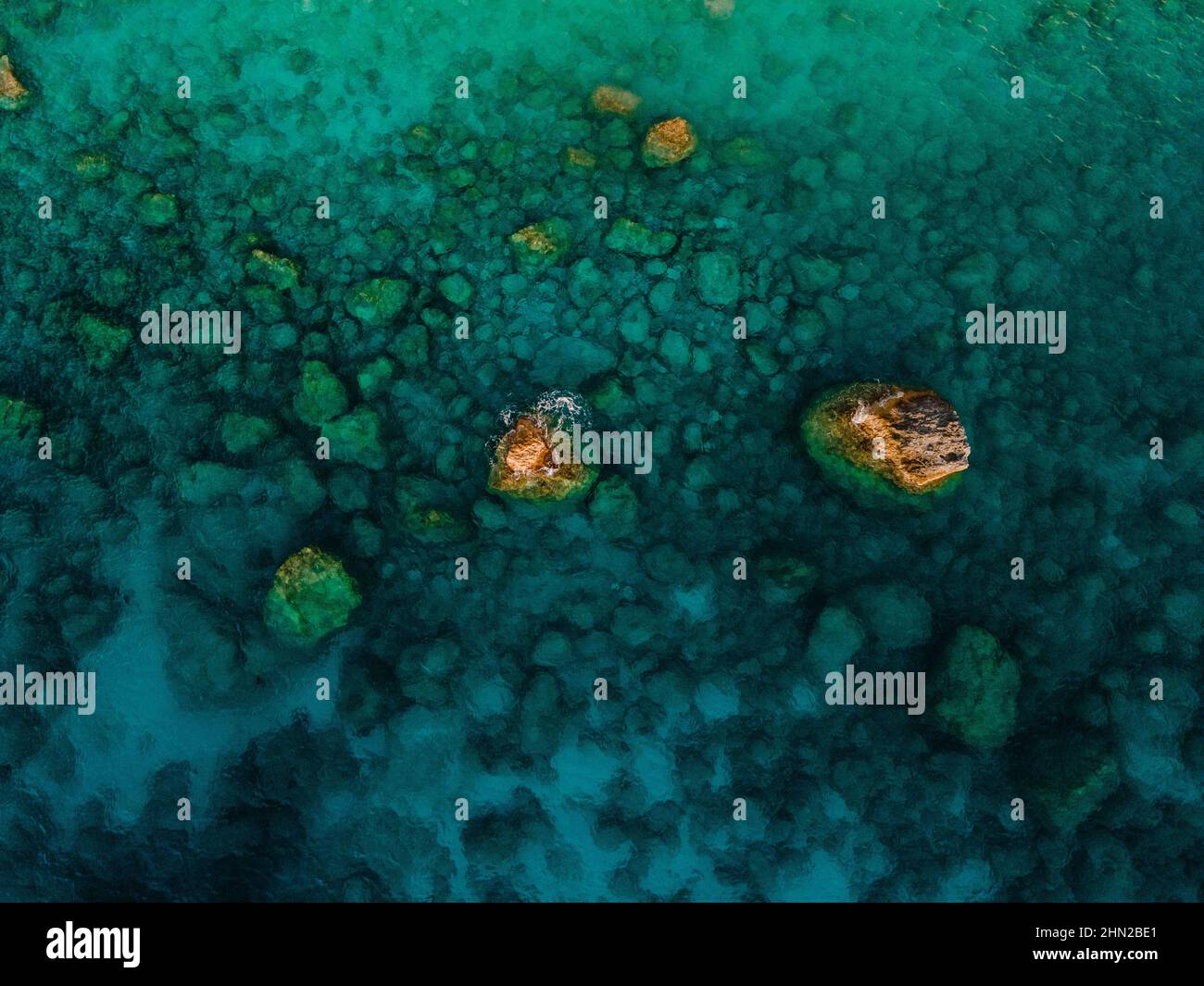 aerial view of sea rocky beach clear azure water Stock Photo - Alamy