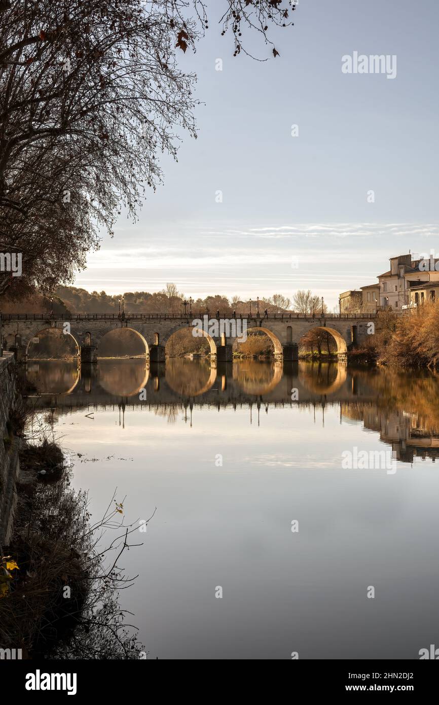 Roman bridge over the river Virdoule, Sommières, Gard, South of France Stock Photo