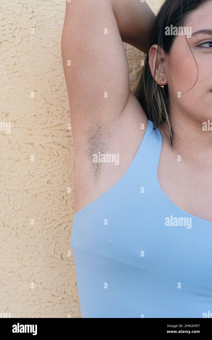 Detail of an unshaved female armpit. Femininity Concept. Stock Photo