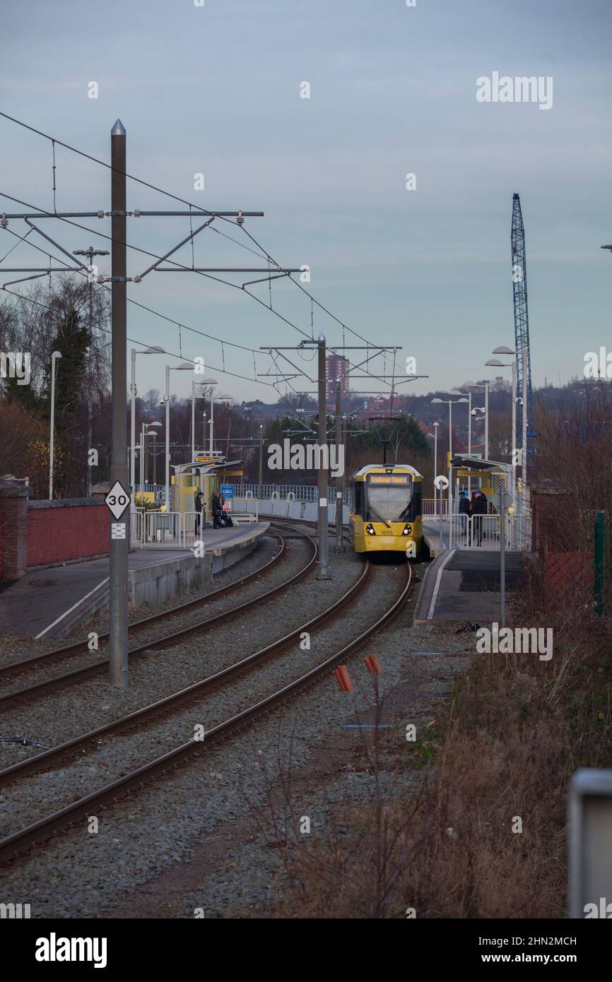 Manchester Metrolink Bombardier Flexity M5000 tram 3030  at Holinwood  tram stop on the off street section Stock Photo