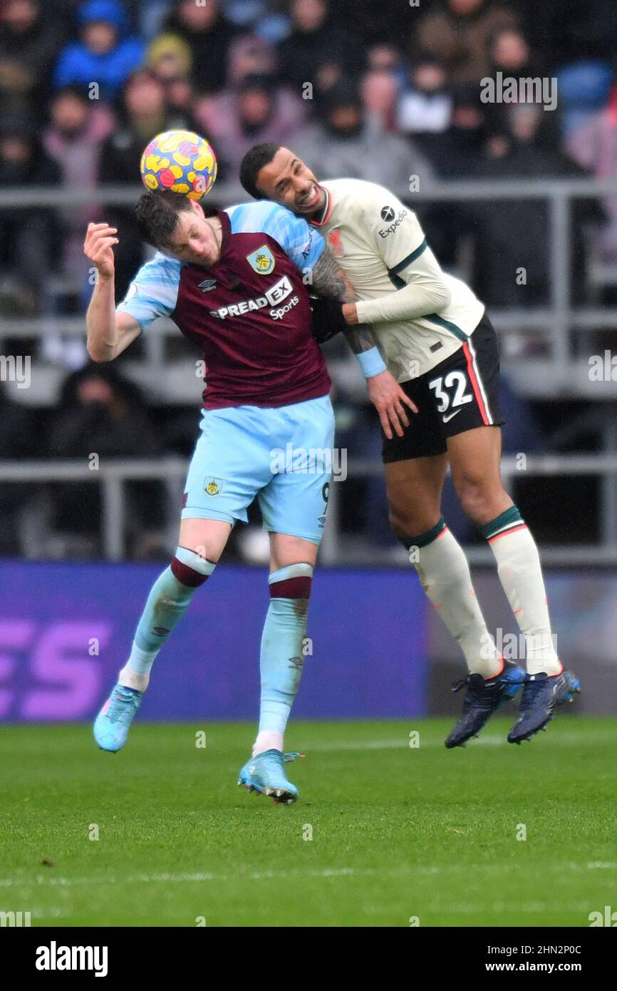 Burnley, UK. 13th Feb, 2022. Burnley's Wout Weghorst and Liverpool's Joel Matip compete for a header during the Premier League match at Turf Moor, Burnley, UK. Picture date: Sunday February 13, 2022. Photo credit should read: Anthony Devlin Credit: Anthony Devlin/Alamy Live News Stock Photo