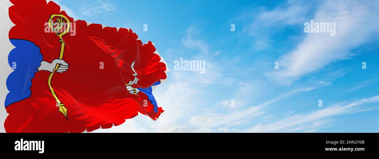 flag of department of Haute Loire, France at cloudy sky background on sunset, panoramic view. French travel and patriot concept. copy space for wide b Stock Photo
