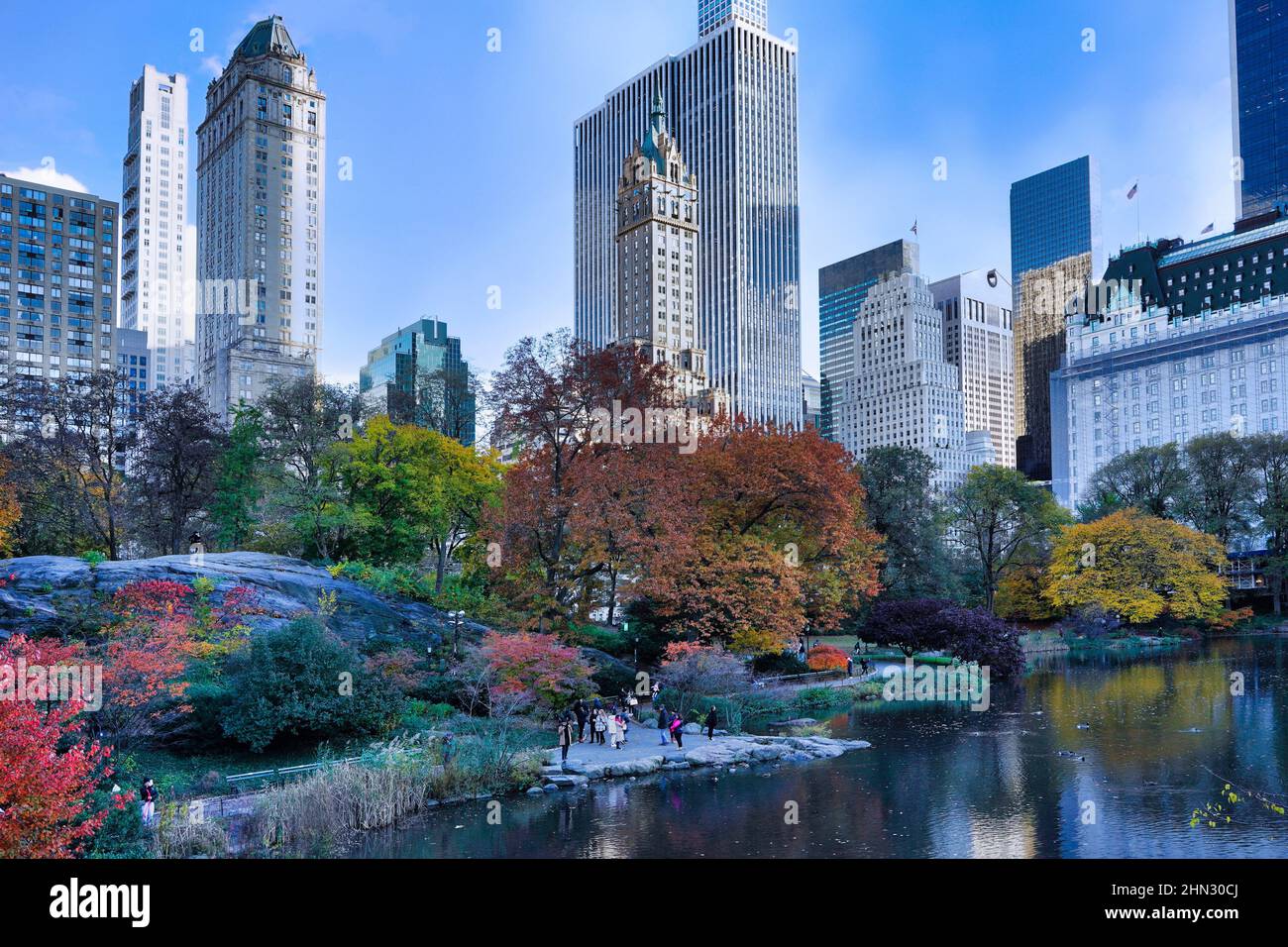 New York Central Park, the Pond at the corner of 5th Avenue and 59th street, with fall colors on trees Stock Photo