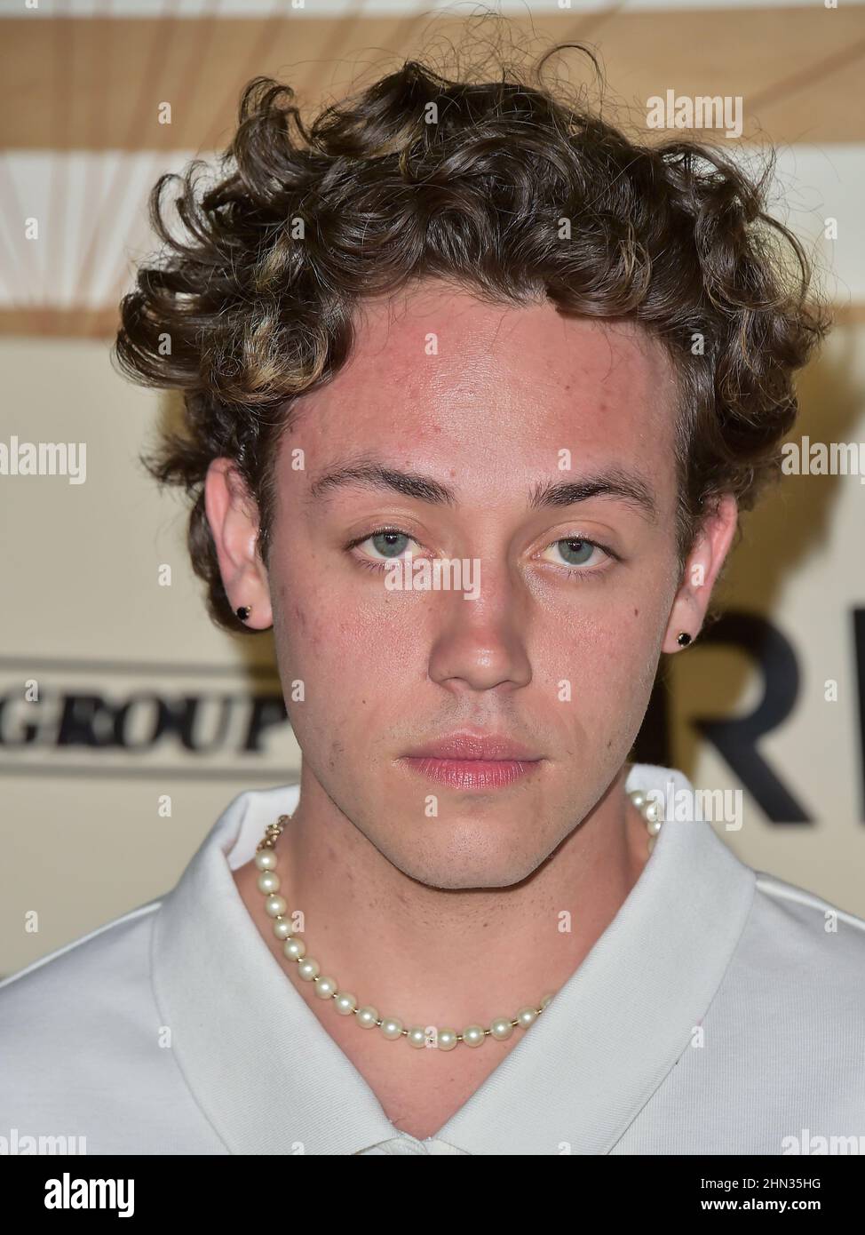 West Hollywood, United States. 12th Feb, 2022. WEST HOLLYWOOD, LOS ANGELES,  CALIFORNIA, USA - FEBRUARY 12: Ethan Cutkosky arrives at 'Homecoming  Weekend' Featuring Drake Hosted By The h.wood Group And REVOLVE Presented