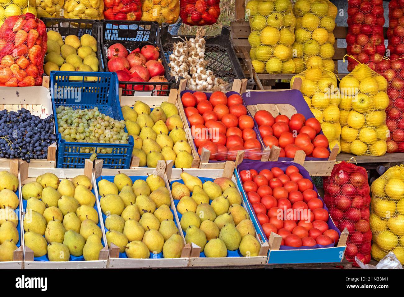 Fresh organic fruits in crates sold on market stall Stock Photo - Alamy