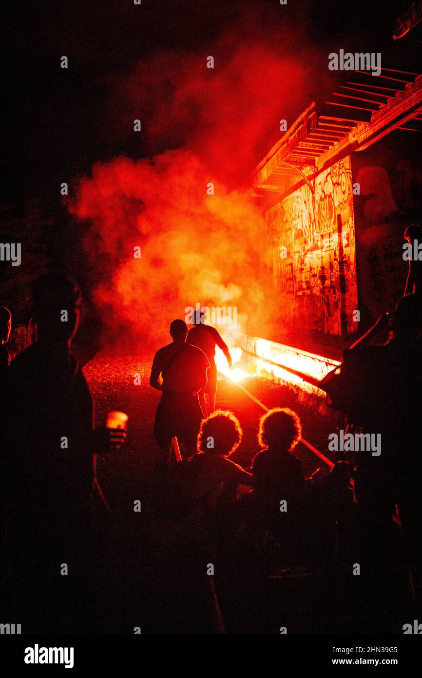 Closeup of a red smoke bomb near the building Stock Photo Alamy