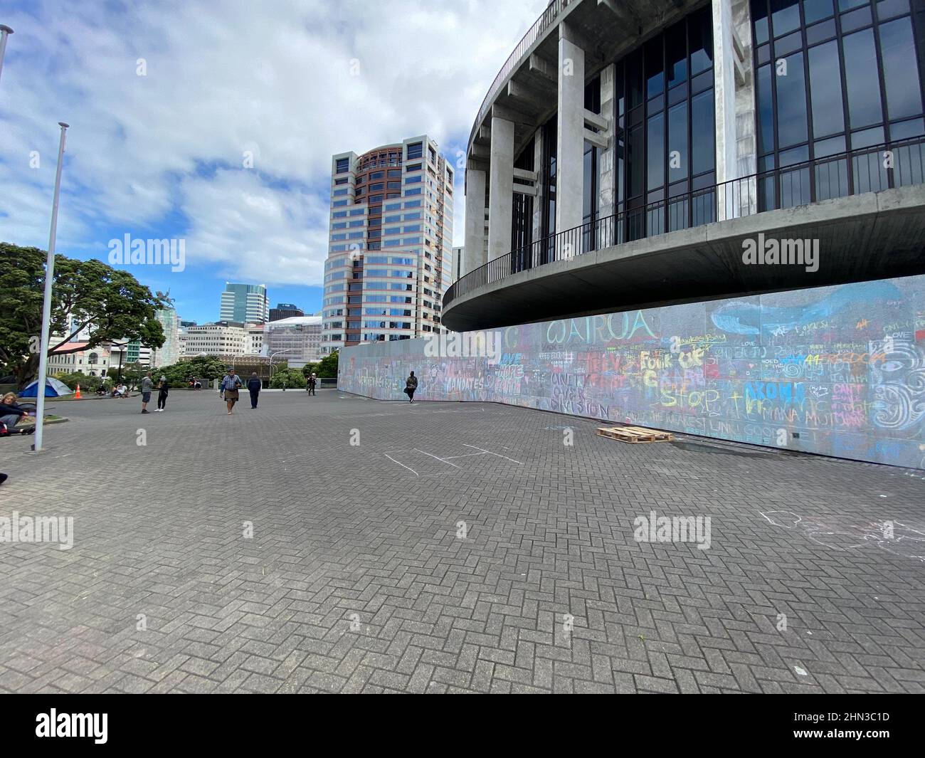 A view of the parliament as protesters against the coronavirus disease (COVID-19) restrictions and vaccine mandates camp in front of it, in Wellington, New Zealand, February 14, 2022. REUTERS/Praveen Menon Stock Photo